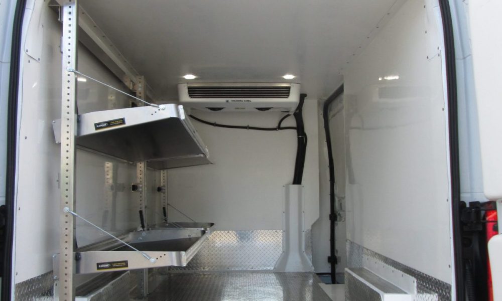 Aluminum treadplate lining protects refrigerated van flooring and sidewalls.