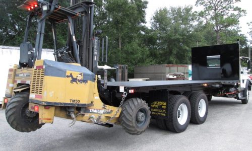 Completed project International Flatbed with forkleft, rear view.