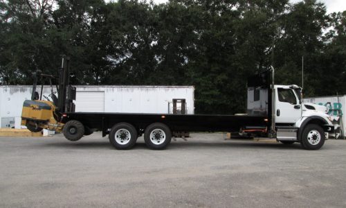 The completed project: International truck with a 26-foot custom flatbed and forklift.