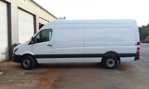 2018 Mercedes Benz refrigerated van with Thermo King unit, curbside view.