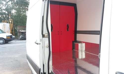 Front view, custom insulated and removable bulkhead in refrigerated van.