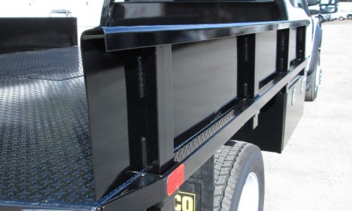 Custom fabricated side panels fit in stake pockets and easily removed.