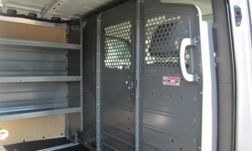 Adrian Steel partition with perforated center and curbside panels.