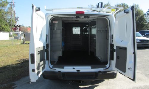 Nissan NV Cargo van with Adrian Steel HVAC shelving package, Curt hitch and Kargo Master drop-down ladder rack.