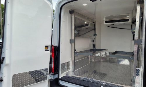 Refrigerated Van with wall mount fold down shelves.
